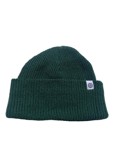 Green knit beanie with a logo on a white background