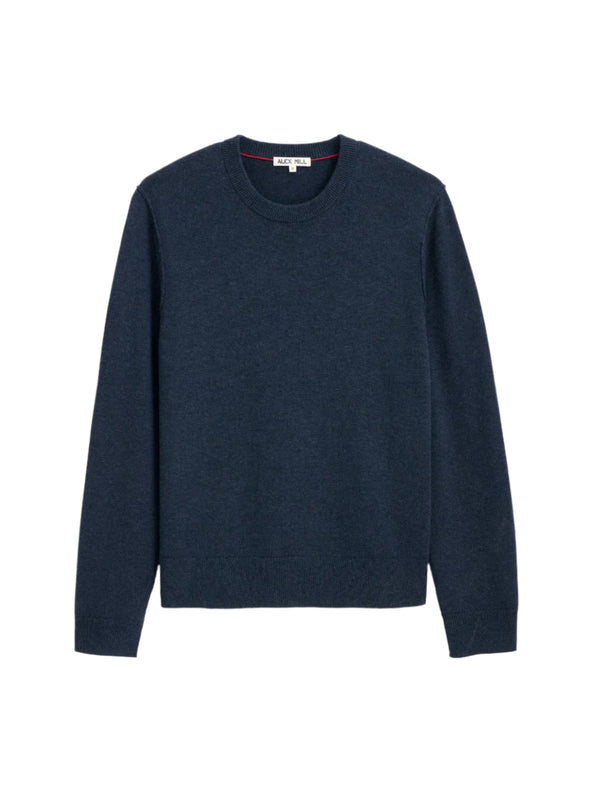 Navy blue sweater on a light gray background